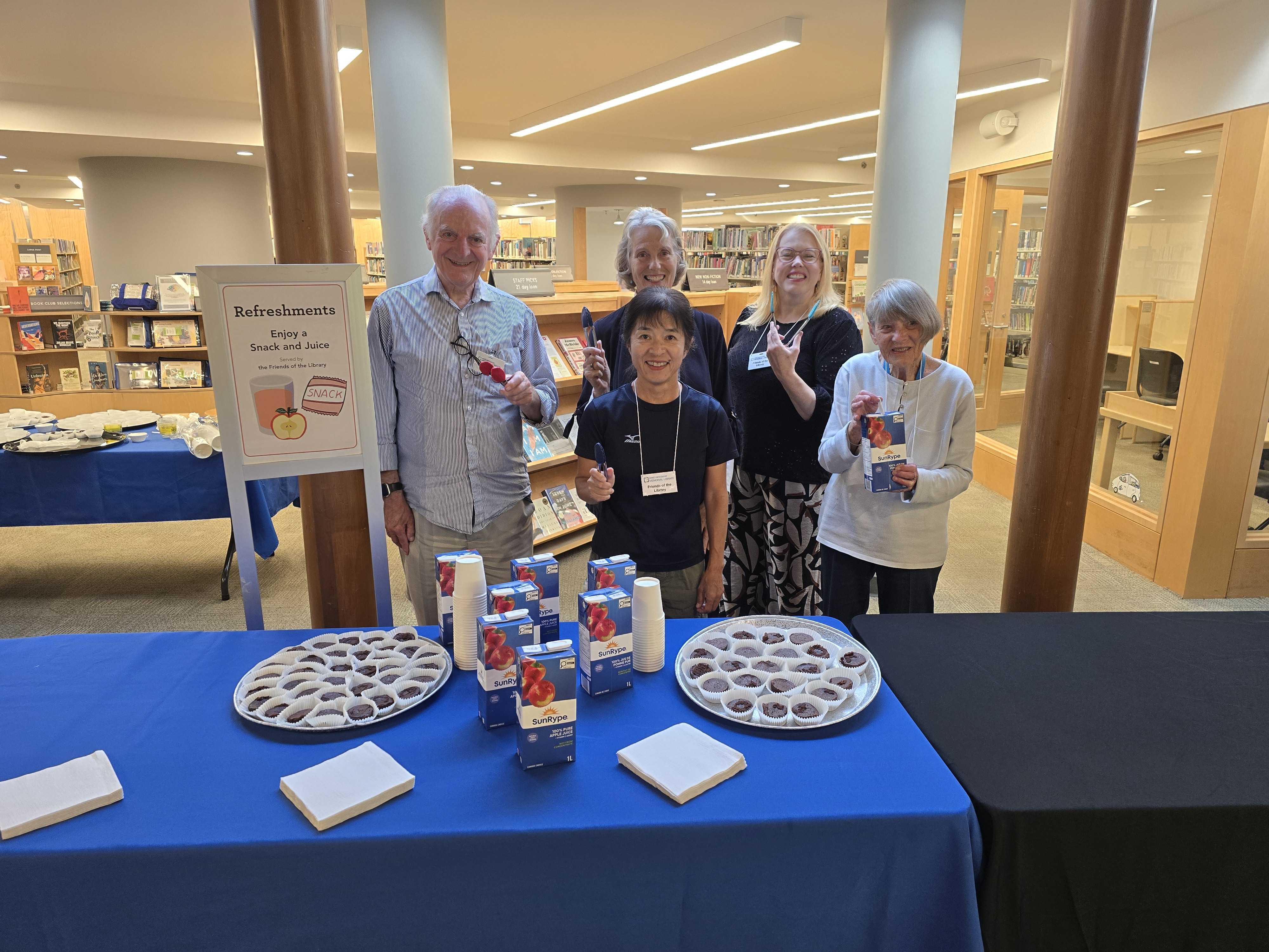 The Friends of the Library proudly serve refreshments at the Summer Reading Club medal ceremony
