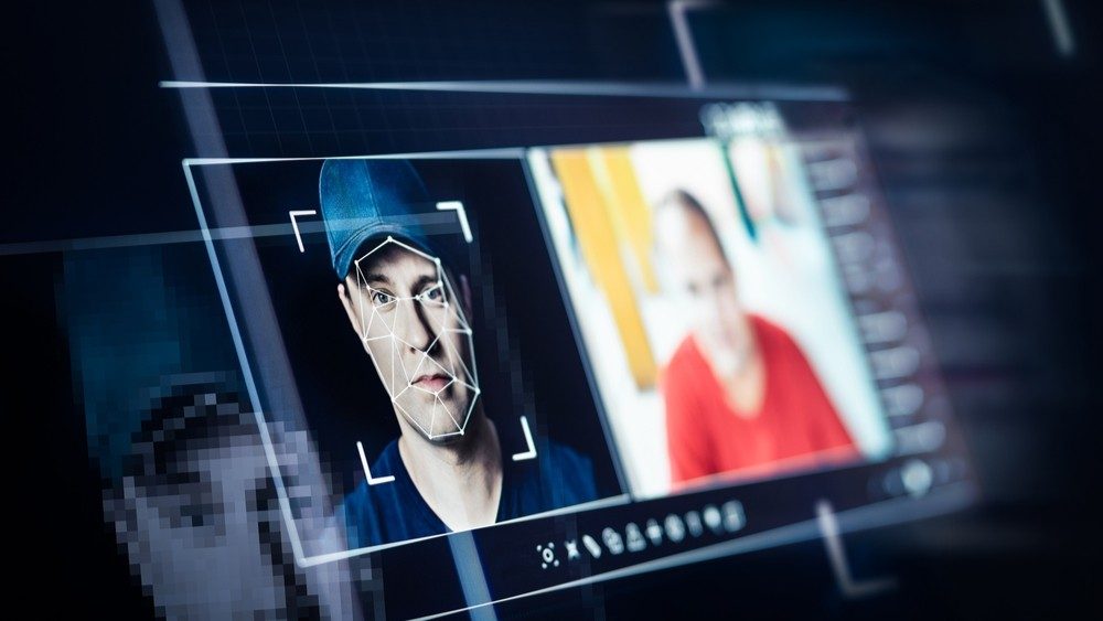 A screen shows an image of a man being selected by a cursor