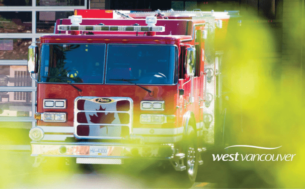 A firetruck with a Canada flag on the front 